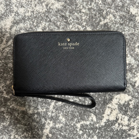 kate spade Handbags - Kate Spade zip around wallet / wristlet
